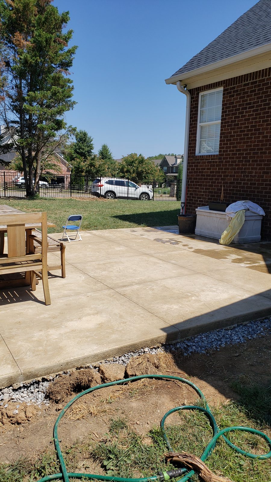 Backyard concrete patio — Brentwood — completed by KDC Construction, Middle Tennessee