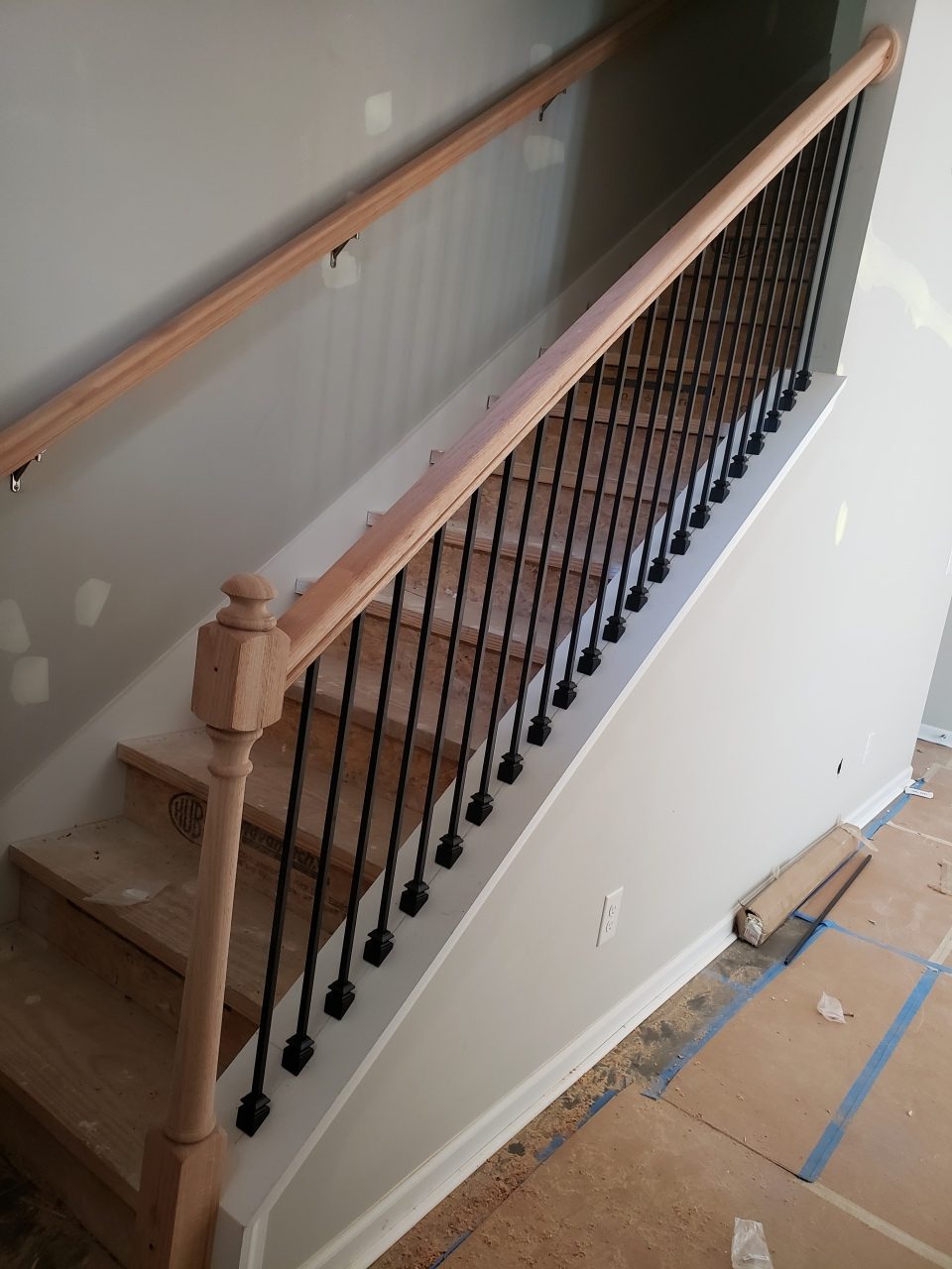 Finish Carpentry: Wood & iron stair install — Spring Hill — KDC Construction, Middle Tennessee